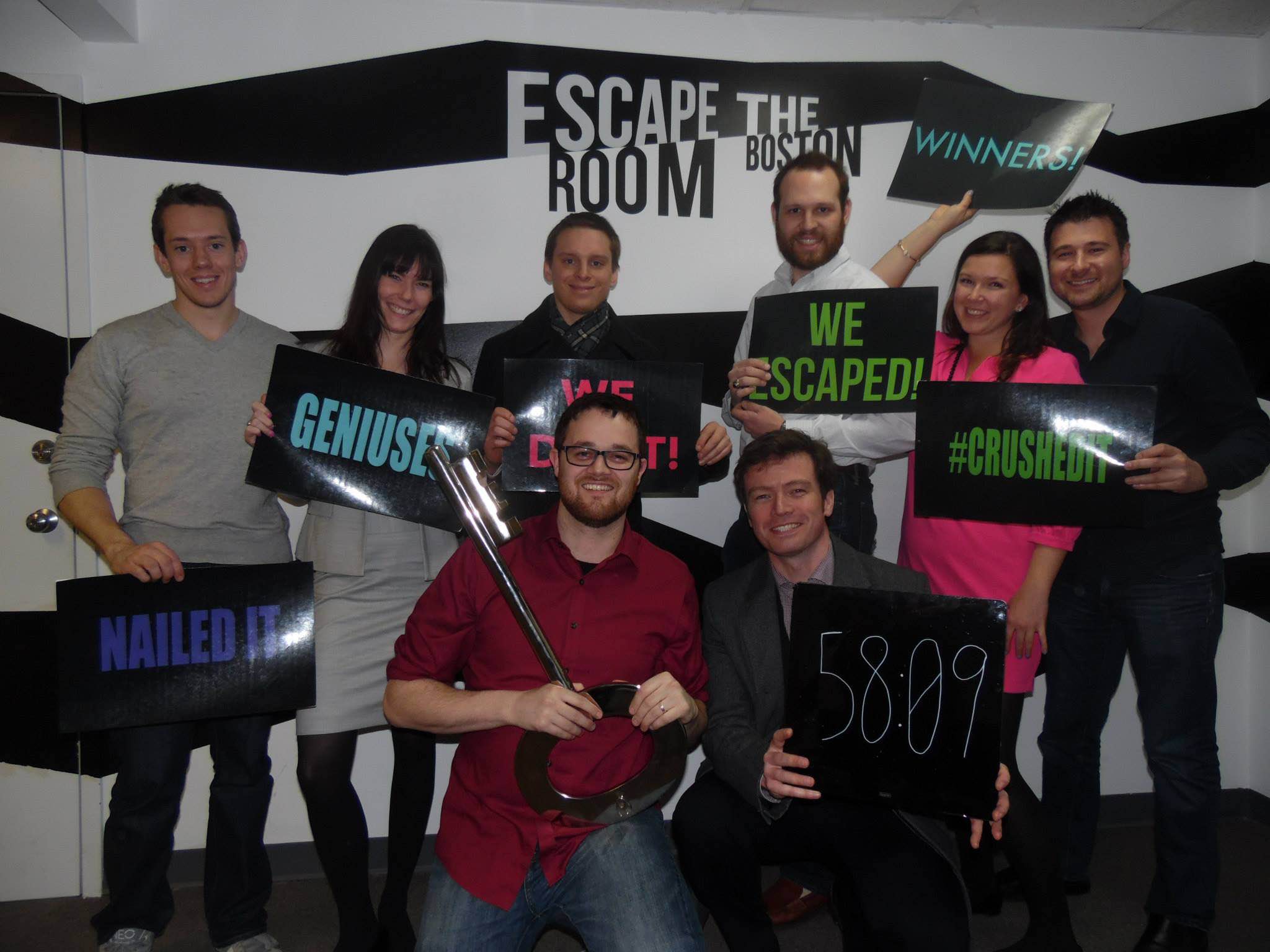 Colleen and her teammates at Escape the Room Boston. 