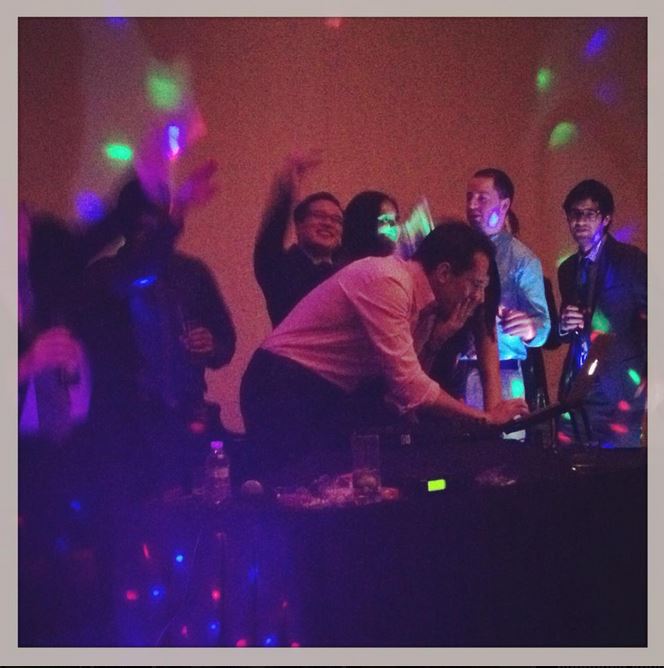 Wilfred DJing at Brafton's annual holiday party. 